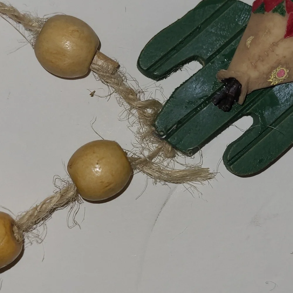 Vintage resin cactus western Christmas garland. Approximately 85 inches long